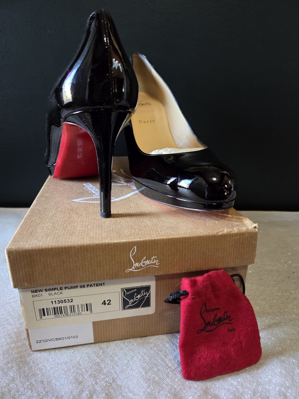Christian Louboutin Black Patent Pointed Toe Pumps with Red Sole
